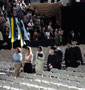 Penn College employee Dawn M. Moore leads the procession of graduates