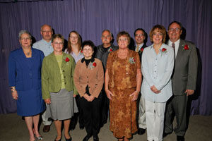 The newest members of the Quarter Century Club stand for a group photo with President Gilmour on Thursday morning. Back row, from left, are Richard Sarginger, Shelley Reynolds, Michael Miller, Craig Cian and Eric Ranck. Front row, from left, are Arlene Deppen, Margaret Ayers, Mary White and Denise Leete.