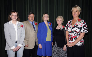 Some of this year's inductees to the Quarter Century Club assemble on stage for a photo Thursday. From left are Linda D. Huffman, custodian%3B Michael J. Stanzione, director of athletcs%3B Ann Marie Furdock, associate professor of biology%3B Karen W. Tyler, secretary to financial operations%3B and Jocelyn T. Thomas, advisement center specialist I.