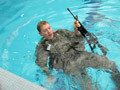 With dummy weapon in hand, a cadet prepares to 'ditch' his gear