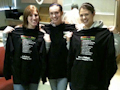 Students show '10 Reasons I Love Being A Radiologic Technologist' shirts.