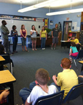 RAs close out their 'Random Act of Kindness' observance by talking to schoolchildren about careers.