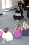 Nicole S. Staron, library circulation supervisor, helps the Bunnies learn 'What Makes a Rainbow?'