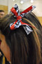 A red ribbon adorns the hair of Community Assistant Brandy L. Krause, a member of the dance team