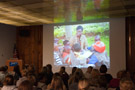 A slide show illustrates the activities of children attending the preschool, which opened in May and is ready for expansion