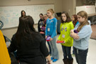 SMART Girls learn about injection molding during a 'Plastics and You!' workshop