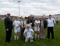 Kimberly Daley (7) and Samantha Wallish join family and The Wildcat for Senior Day festivities at Thursday's soccer game against Penn State Beaver