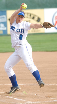 Kristin Bernard sends another pitch whizzing homeward.