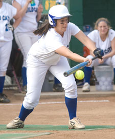 Jamye Mease deftly lays down a bunt at Elm Park on Wednesday.