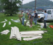 Sorting through building material are, from left, Williams, Christoffel, Ball and Jiao