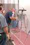 An automotive instructor makes quick work with a paint-lab spray gun