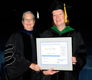 Pennsylvania College of Technology President Davie Jane Gilmour (left) and Excellence in Teaching award winner Carol J. Kafer, associate professor of biology.