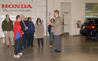 Paul L. Starkey, Penn College's vice president for academic affairs/provost (right), explains the college's Honda partnership to a group that includes DEP Secretary Michael L. Krancer (second from left) and Harrisburg Mayor Linda D. Thompson (third from right)