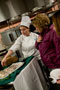 A Tea and Coffee Dessert Tray, served by Tiana J. Soles-Ahner, State College, tempts Sarah S. Moore, sign language interpreter/student support assistant