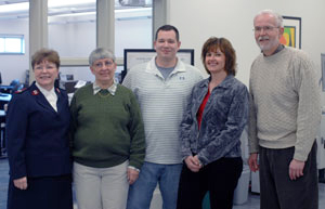 Renewing the partnership between Pennsylvania College of Technology and The Salvation Army are, from left, Salvation Army Maj. Marie Harris, community relations officer and program development officer%3B tax preparers Lynette Trick, Salvation Army budget coach, and Derek Botts, a 2009 graduate of Penn College%E2%80%99s business administration%3A banking and finance concentration%3B Pam Hicks, Salvation Army social service director%3B and Phillip D. Landers, professor of business administration and accounting.