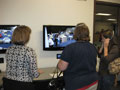 Barbara J. Albert shows participants how the video-monitoring system can be used to teach observation techniques to students