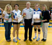 Alyssa M. Covas (9) is joined by her mother, Denise, and Ashley D. Oswald by her parents, Denny and Susan, at midcourt