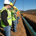 Pennsylvania College of Technology students get a close-up view of Volvo pipe-laying equipment during a recent demonstration at the Wayne Township Landfill in Clinton County.