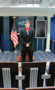 Zachary Derck in front of the stage in the White House Press Room