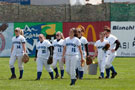 Wearing #14, Claar and some of her teammates leave the field after pregame warm-ups