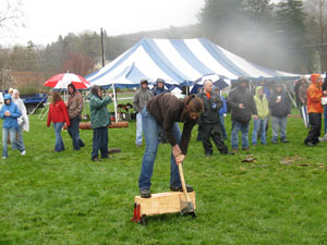 Pennsylvania College of Technology student Sandra M. Angstadt, of Kutztown, competes in the Women%E2%80%99s Speed Chop during the Mid-Atlantic Woodsman%E2%80%99s Meet. She placed second in the event and third in two others. Ty M. Buffington, of Lykens, finished first in the Men's Chain Saw category. Penn College finished third overall.