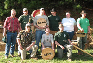 Pennsylvania College of Technology competitors and one of their faculty advisers gather for a group photo during the recent Mid-Atlantic Woodsmen%E2%80%99s Competition in Clyde, N.C. Kneeling, from left, are students Brendan A. Wilson, Melissa D. Berrier and Jonathan L.  Snyder. Standing, from left, are Jack E. Fisher, lab assistant for forestry%3B and students Thomas D. Miller, Jonathan R.  Thomas, James D. Aumiller, Valerie E. Hoover and Derek J. Peterson.
