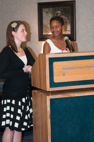 Bronwen C. Klem, left, and Nuria S. Hunter relate their experiences with the Penn College Youth Leadership program during Thursday's board of directors meeting.