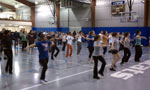 Zumba participants fill the Field House floor with energy to burn