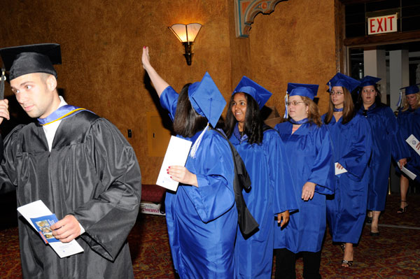Students acknowledge faculty and family prior to the ceremony.