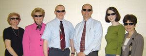 Handing out sunglasses Wednesday to kick off the 2005-06 Annual Fund Employee Campaign were, from left , Barbara A. Danko, director of alumni relations%3B Debra M. Miller, director of corporate relations%3B James F. Finkler, annual giving officer%3B Barry R. Stiger, vice president for institutional advancement%3B Tara R. Major, data assistant%3B and Joanne Kay, executive director of the Penn College Foundation.