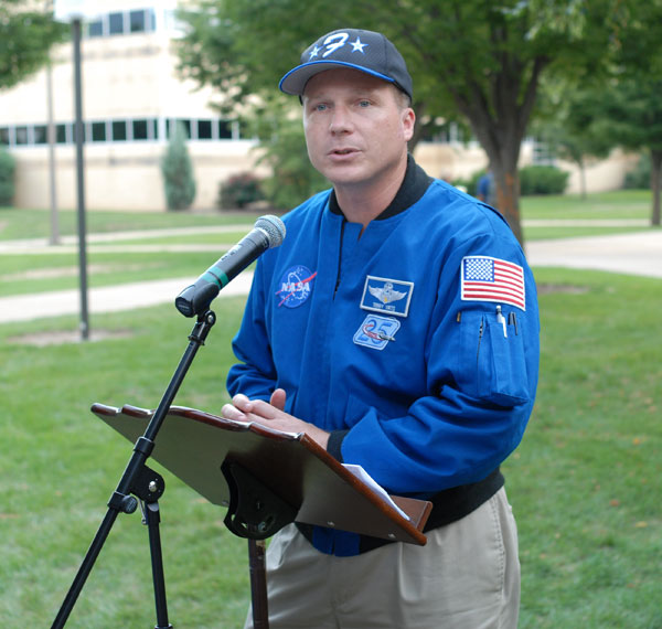 Air Force Col. Terry Virts, pilot of the Space Shuttle Endeavour and a Little League coach in Houston, talks to the cookout crowd.