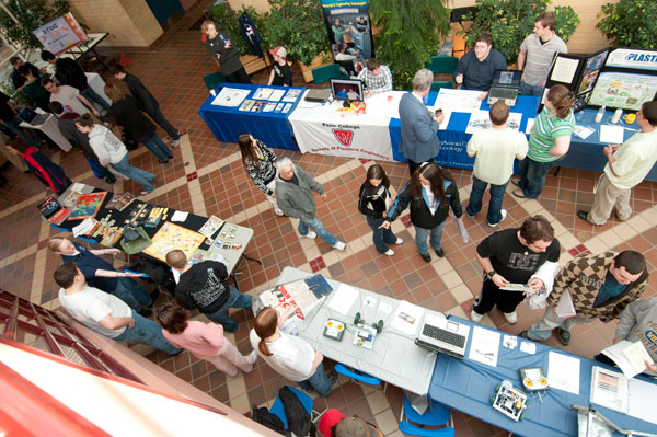 From an overhead vantage, student organizations fill the Breuder Advanced Technology and Health Sciences Center atrium.