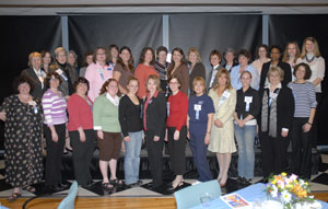 Thirty-one of the evening's 'Awesome' honorees gather for a group photo in Penn's Inn
