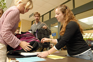 Students bring backpacks to Wednesday's OTA club 'weigh-in' outside the Susquehanna Room. (Photo by Phillip C. Warner, student writer-photographer)
