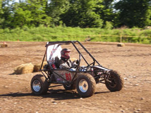 Penn College%E2%80%99s Mini Baja car is put through its paces at the Hogback Hill motocross track in Palmyra, N.Y., where it competed against 140 other college and university teams.