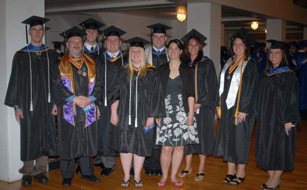 Banking, finance and accounting students gather for a pre-commencement souvenir in The Genetti.