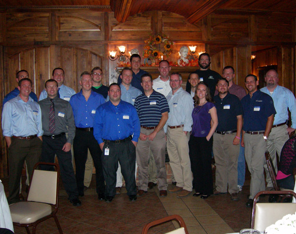 Construction Management alumni, with assistant professor Wayne R. Sheppard (right), fill The Valley Inn banquet room to celebrate their major's two decades of achievement.
