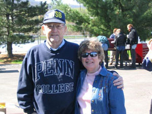 Bill Ward (with Bonnie Powell, secretary to the senior vice president) at the April 2003 Scholarship Ride, one of his last visits to campus.