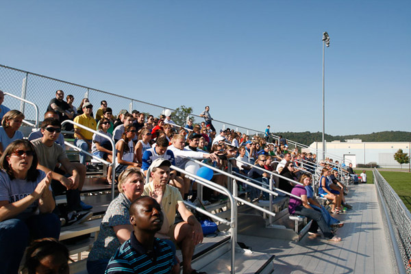 Fans pack the stands for afternoon soccer action on the Athletic Field.