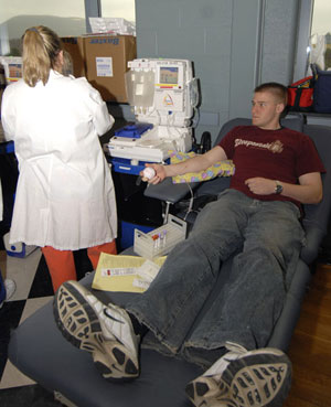 A Penn College student donates blood via the automated double red-cell donation process during Wednesday's Bloodmobile in Penn's Inn. (Photo by Amanda M. Williamson, casual part-time student photographer)