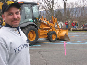 Budd L. Greevy, instructor of diesel equipment technology, wears his Penn College Pride during the Heavy Equipment Rodeo he organized at the Schneebeli Earth Science Center. (Photo by Misty Kennard-Mayer, coordinator of matriculation and retention, School of Natural Resources Management)