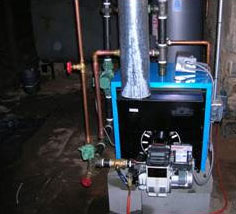 The completed boiler, newly installed and providing comfort and heat for area woman.