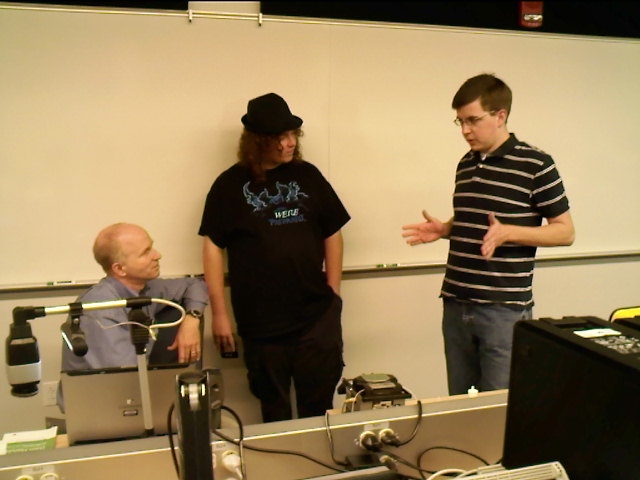 Jeff Rankinen, associate professor of electronics (seated), talks with two of his students: Kyle G. Mason, of Dowingtown, (center), and Alexander J. Milwid, of York.