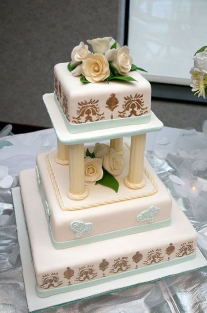 Hand-made stencils among tools used to decorate this cake.