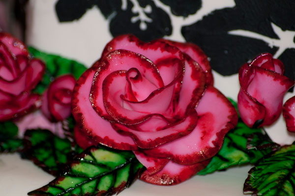 Bold painted roses show off a students skill.