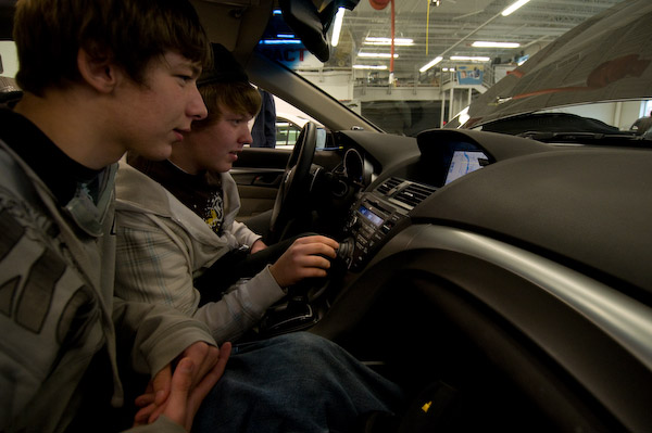 Students from Bloomsburg High School check out Acura technology in the Colleges new automotive lab. 