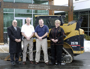 Recently completing the donation of a multi-terrain loader to Pennsylvania College of Technology are, from left, Wayne R. Longbrake, the college's dean of natural resources management%3B Karl Quinn, training manager for Alban Tractor Co. Inc., instrumental in arranging the donation%3B Mark Wilkinson, service operations representative, Caterpillar Inc.'s Harrisburg District%3B and Debra M. Miller, the college's director of corporate relations.