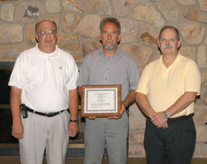 From left are Wayne R. Longbrake, dean of natural resources management%3B David C. Johnson, instructor, diesel equipment technology%3B and Gerald Brightbill of Cleveland Brothers Equipment Co. Inc.