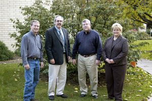 From left, Thomas J. Mulfinger, associate professor and department head, building construction technology%3B Tom F. Gregory, dean of construction and design technologies%3B William T. Faulk Jr., Centex Homes' regional director of construction services%3B and Debra M. Miller, director of corporate relations at Pennsylvania College of Technology.