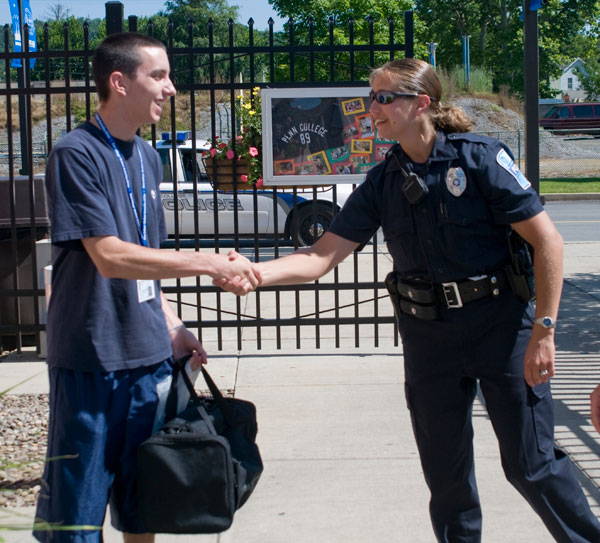 Penn College Police Officer Jen J. Bowers welcomes an incoming student.